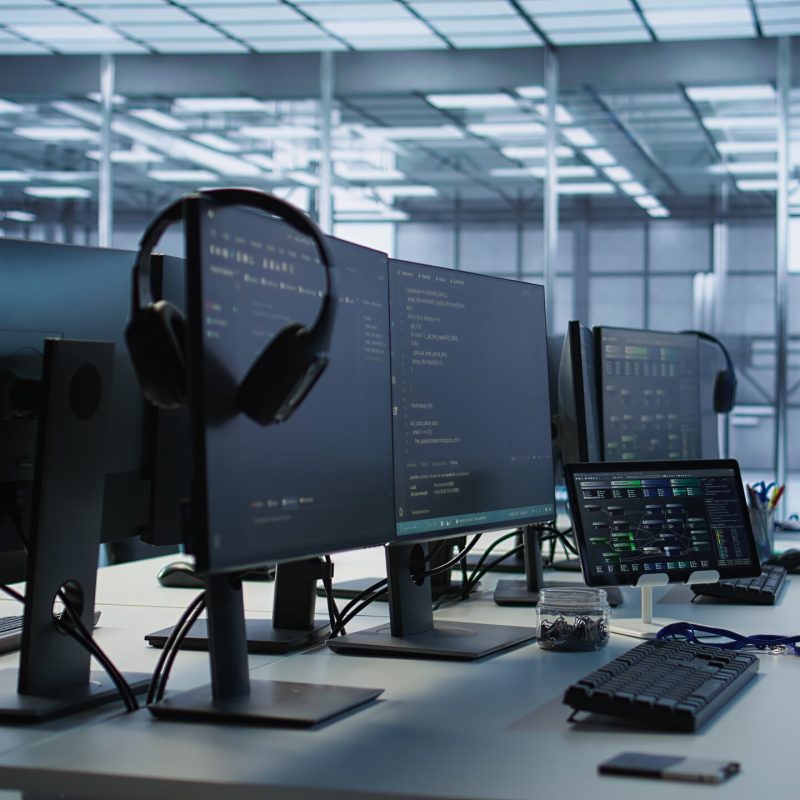 Artificial intelligence applications used in data center workplace to maintain company network equipment, handheld camera shot. AI programs used in server room to ensure optimal system performance